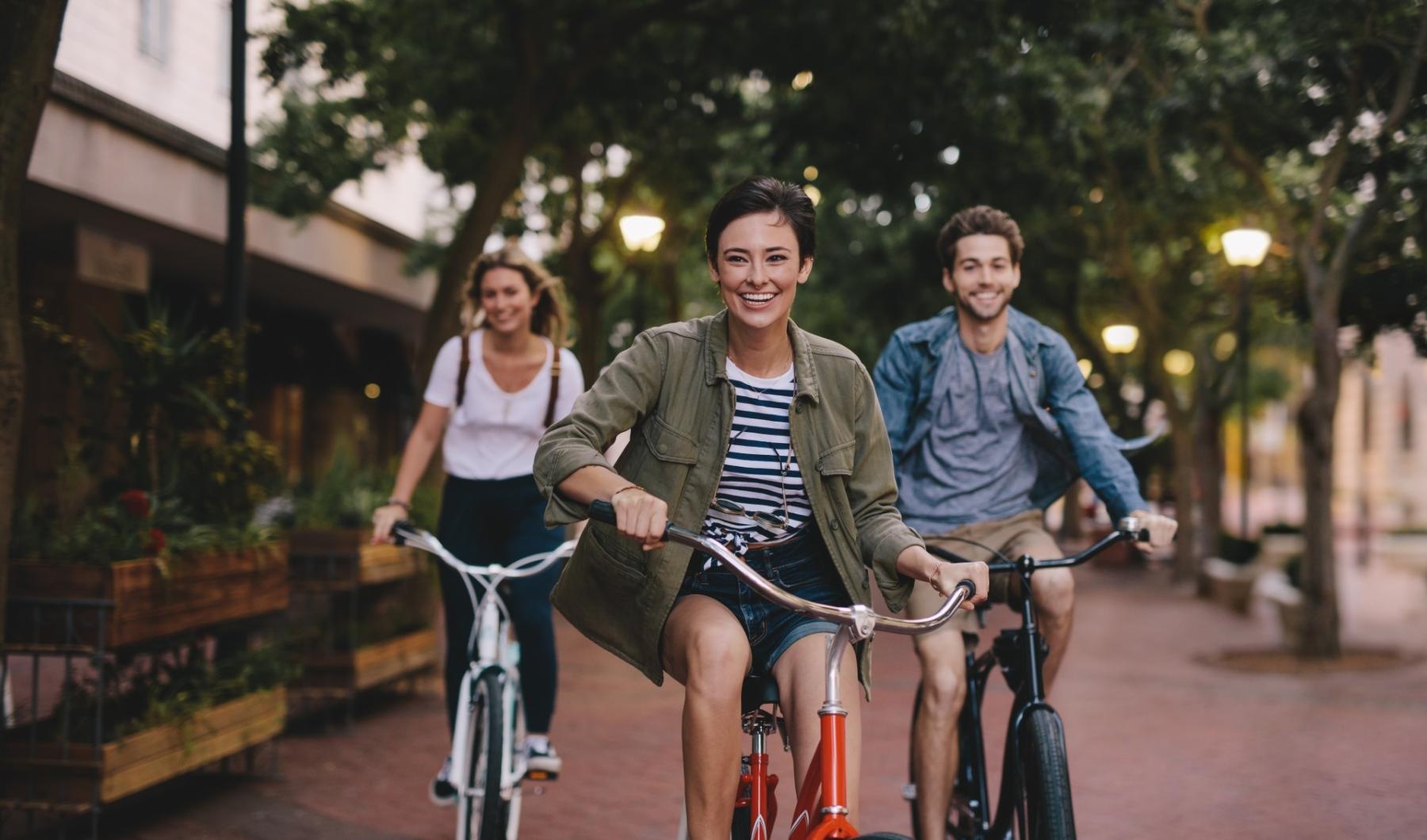 a group of people riding bikes