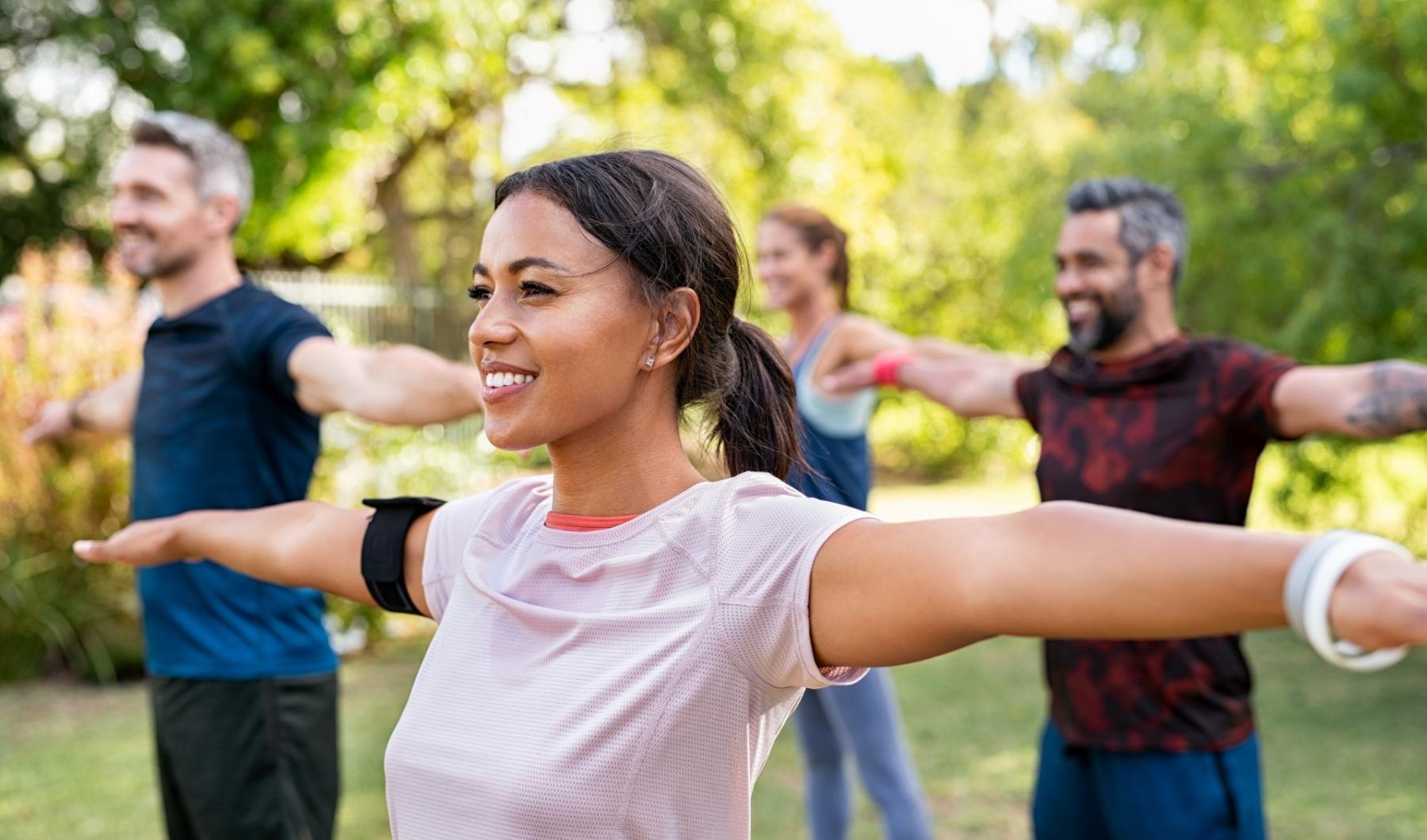 a group of people doing yoga